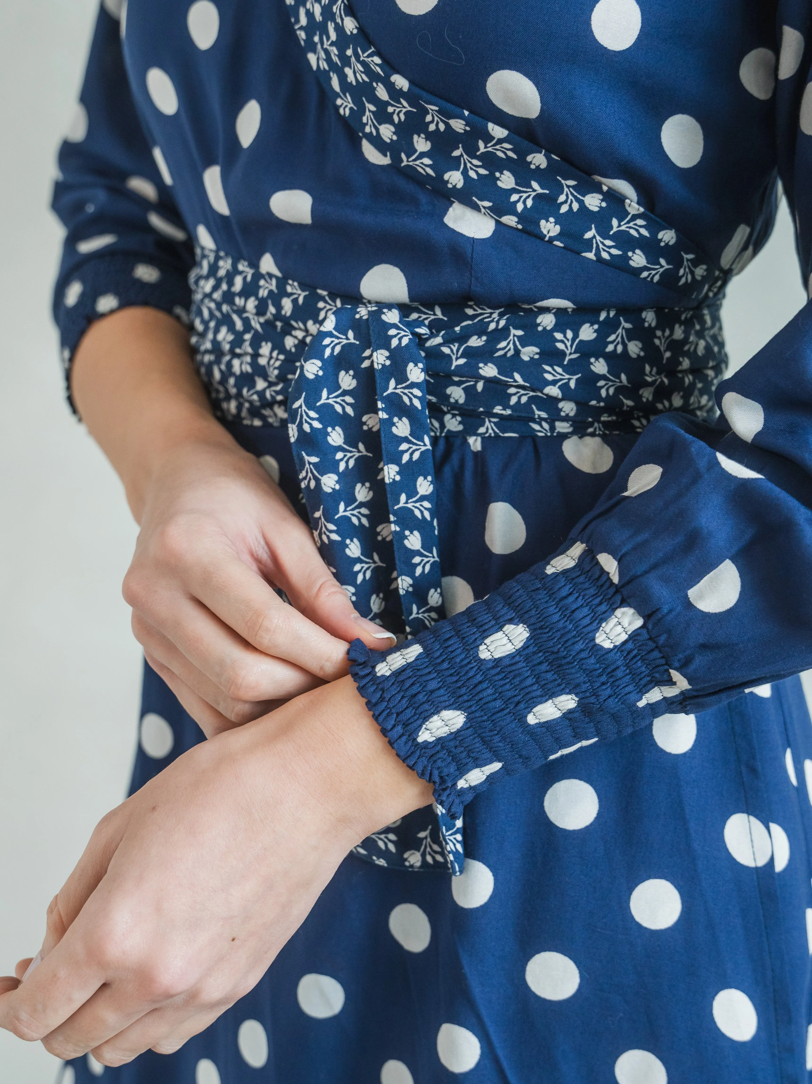'IT'S A WRAP' DRESS IN NAVY POLKA DOT (EcoVero)
